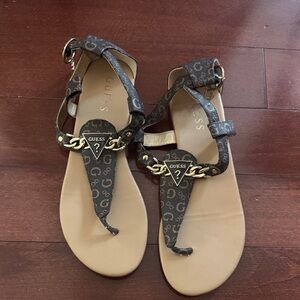 GUESS Brown Logo Chain T-Strap Sandals with Gold Accents